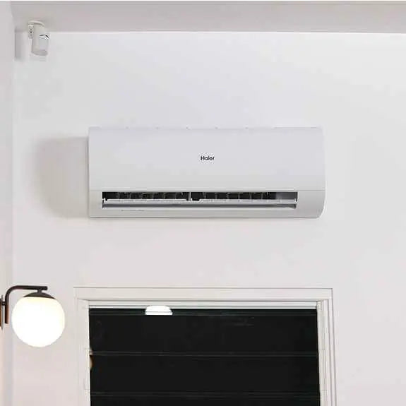 Wall-mounted Haier Tempo Series AC unit in a home interior, showcasing sleek design and quiet operation for efficient cooling.